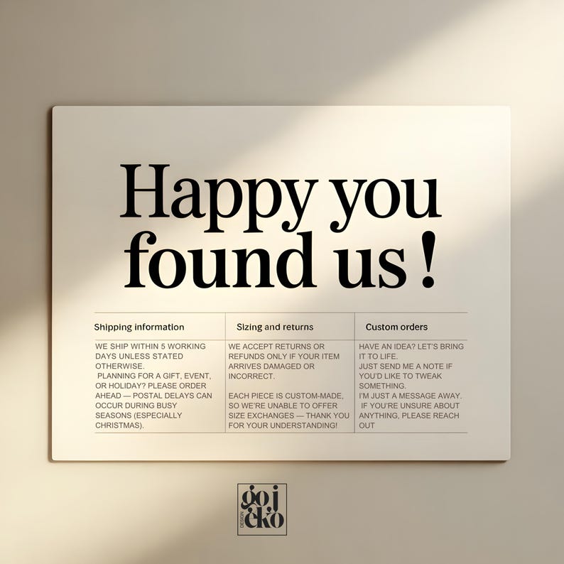 May include: A rectangular sign with the text "Happy you found us!" in a bold, black font. Below, three columns detail shipping, sizing, and custom order information. The sign has a neutral background and a small logo at the bottom.