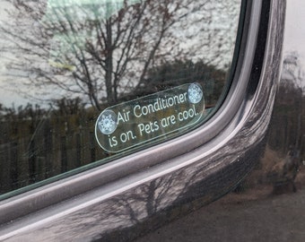 Sign "AC is on. Pets are cool." with window suction cups, 2 pack