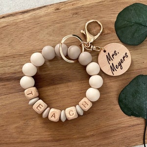 Teach | Wristlet | Beaded Bracelet Keychain | Silicone Beaded | Wildflowers | Custom Name | Laser Engraved | Wood Charms | Teacher Gifts