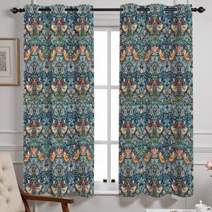 May include: Two matching window curtains with a detailed floral and bird pattern. The design features a dark teal background with colorful birds, flowers, and foliage in shades of orange, red, yellow, and green. The curtains have grommets for hanging.