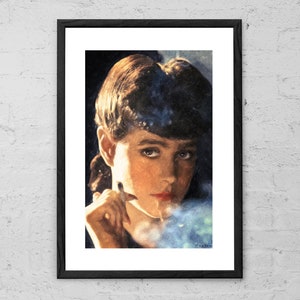 May include: A close-up portrait of a woman with dark hair and a smoky eye. She is wearing a dark shirt and has a cigarette in her hand. The background is blurred and out of focus.