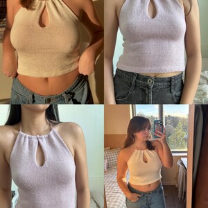 May include: A collection of four halter tops in cream and lavender. Each top features a keyhole detail at the neckline. The tops are made of a knitted material and are paired with blue jeans.