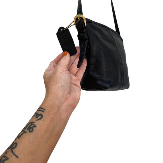Coach sling bag with tattoo discount