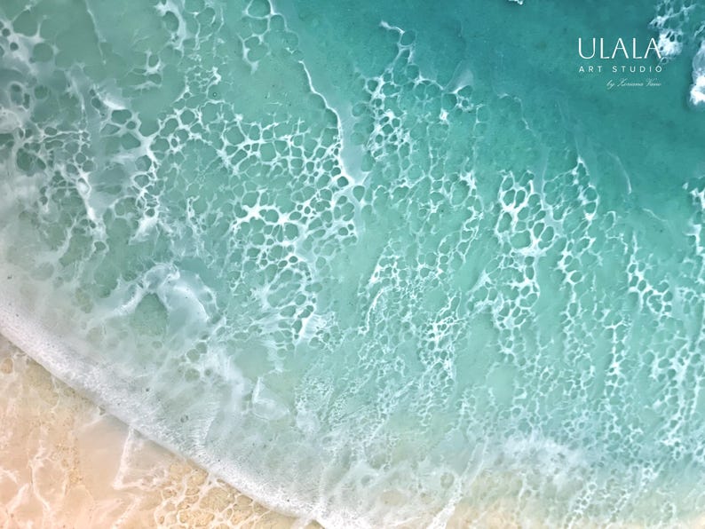 May include: Abstract painting of a turquoise ocean with white foam waves. The painting has a textured surface and a light blue and white color scheme.