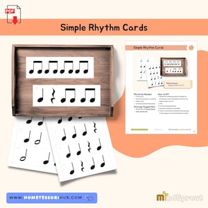 May include: A wooden tray displays printed rhythm cards with black musical notes on white backgrounds. The cards feature quarter notes, eighth notes, and rests. The text "Simple Rhythm Cards" is at the top.