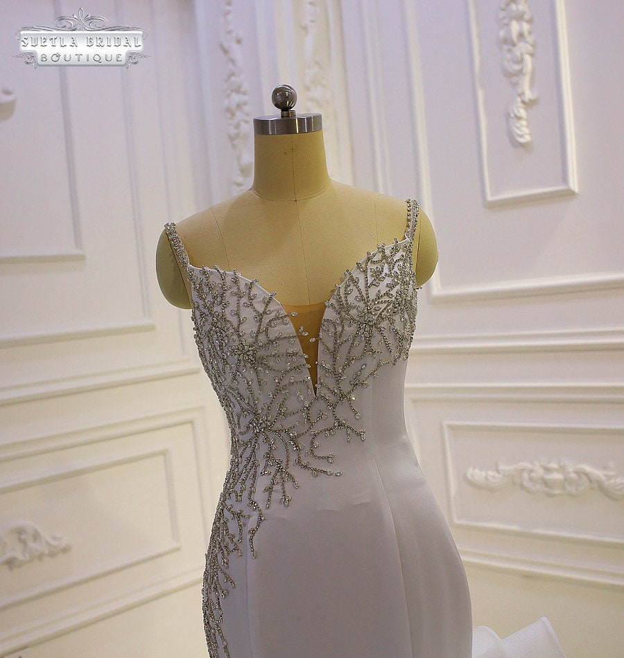 Shop beading spaghetti straps ruffled white mermaid wedding dress