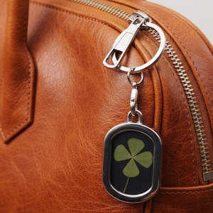 Oval Talisman Keychain with Genuine Four Leaf Clover Lucky Charm Unique Elegant and Made in France to Attract Luck and Joy
