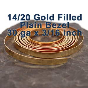 May include: A roll of 14/20 gold filled plain bezel wire, 30 gauge and 3/16 inch wide.