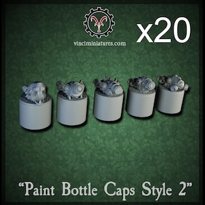 Puede incluir: Cinco tapas de botes de pintura grises, estilo 2, se muestran sobre un fondo verde. Cada tapa tiene un diseño mecánico detallado en la parte superior de una base cilíndrica. El texto "x20" está en la esquina superior derecha.
