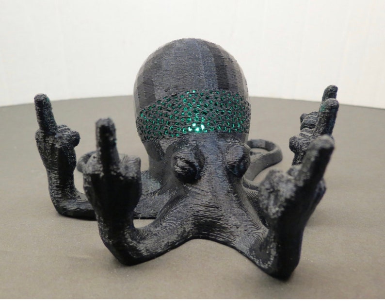 This is the Fucktopus in black colour with a green Led light inside