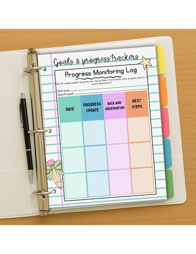 May include: A white binder with a progress monitoring log. The log includes sections for date, progress update, data and observation, and next steps. The log is designed for tracking goals and progress. A black pen is visible.