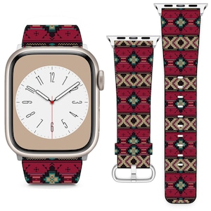 May include: A red, black and beige patterned Apple Watch band with a geometric design. The band is shown on a silver Apple Watch with a white face.