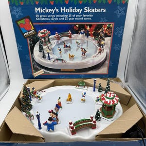 Mr Christmas Holiday Skaters - Etsy