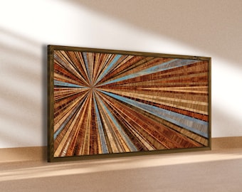 Puede incluir: Una impresión de arte abstracto enmarcada con un diseño geométrico de chapa de madera marrón y azul. El diseño presenta un patrón radial de finas tiras de madera que irradian hacia afuera desde el centro.