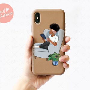 May include: A brown phone case featuring an illustration of a person reading a book while seated in a gray armchair. The illustration includes a plant in a blue and white striped pot. The phone case has the text "Britt Sketches" in a pink circle.