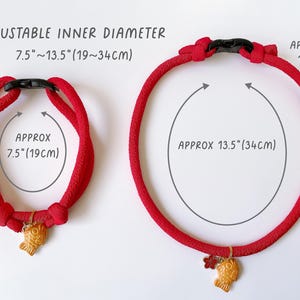 May include: Two red rope pet collars with black clasps and gold-colored charms. The smaller collar has an approximate inner diameter of 7.5 inches (19 cm). The larger collar has an approximate inner diameter of 13.5 inches (34 cm). Text reads: ADJUSTABLE INNER DIAMETER 7.5"~13.5" (19~34CM).