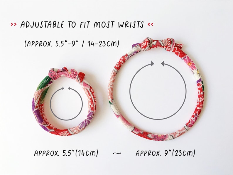 May include: Two fabric bracelets with floral patterns in red, pink, and green. The text says "ADJUSTABLE TO FIT MOST WRISTS" and the bracelets are approximately 5.5" (14cm) and 9" (23cm) in diameter.