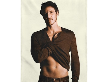 May include: A man wearing a brown long-sleeved shirt, partially unbuttoned to reveal his torso. He is wearing blue jeans and has a serious expression on his face.