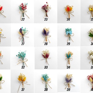 May include: A collection of 40 small bouquets of dried flowers, each tied with twine and numbered 21 through 40. The bouquets are arranged in a grid pattern on a white background.