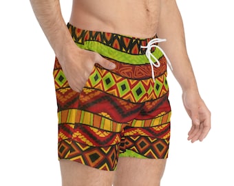 May include: Red, yellow, and green patterned swim trunks with a white drawstring. The pattern is geometric and tribal inspired.