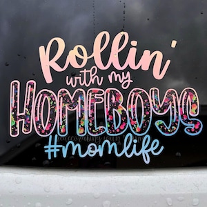 May include: A black and white decal with colorful paint splatters. The decal says "Rollin' with my Homeboys #momlife".