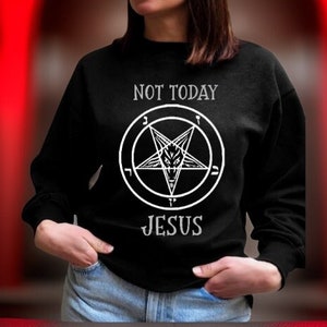 May include: Black sweatshirt with a white pentagram and the text "NOT TODAY JESUS".