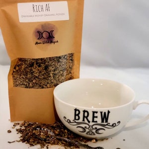 May include: A brown paper bag with the text "RICH AF DRINKABLE MONEY DRAWING POTION" and the logo "Moon Witch Magick" with a triple moon symbol. The bag contains dried herbs and is next to a white ceramic mug with the text "BREW" and a triple moon symbol.