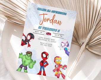 May include: A blue and white invitation with a spiderweb design. The invitation says "Calling all superheroes Jordan is turning 5" with a date and time. The invitation features cartoon images of Spider-Man, Hulk, Iron Man, and Spider-Gwen.