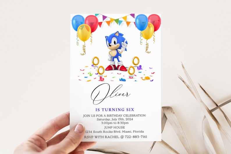 May include: A birthday invitation featuring Sonic the Hedgehog, colorful balloons, confetti, and gold rings. The invitation is for Oliver's sixth birthday party, which will be held on Saturday, July 15th, 2024, from 3:00pm to 8:30pm at Jump House. The address is 1234 South Rocks Blvd., Miami, Florida. RSVP with Rachel at 722-883-7161.