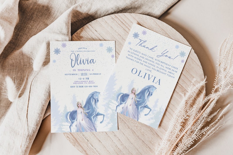 May include: Two blue and white invitation cards with a snowflake design. The card on the left says "Olivia is turning 4" and features an illustration of a girl with a horse. The card on the right says "Thank You!" and features the same illustration.