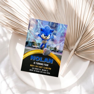 May include: A birthday invitation featuring Sonic the Hedgehog with a blue and yellow design. The invitation includes the text "NOLAN IS TURNING FOUR" and event details. The background shows a lightning effect.