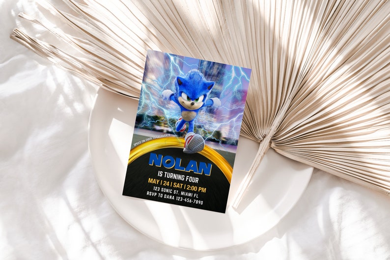 May include: A birthday invitation featuring Sonic the Hedgehog with a blue and yellow design. The invitation includes the text "NOLAN IS TURNING FOUR" and event details. The background shows a lightning effect.