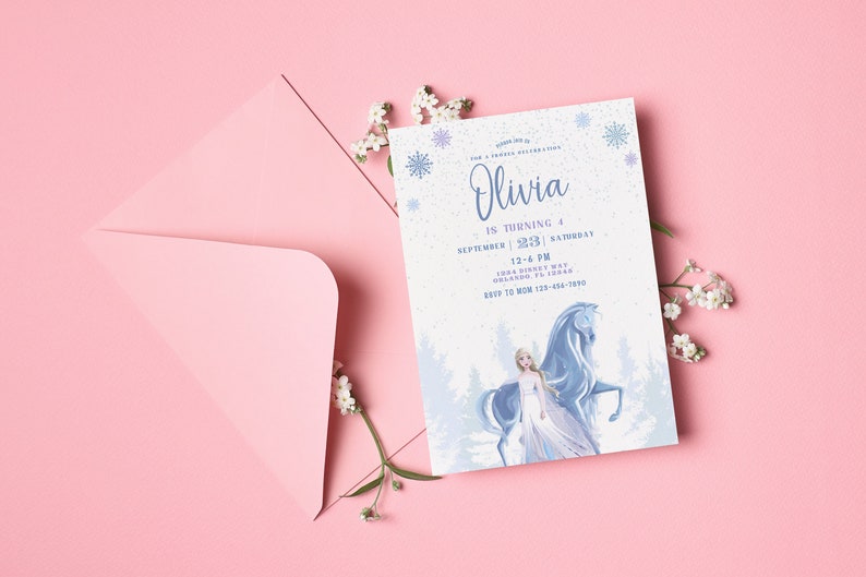 May include: A blue and white invitation card with a snowflake design. The text on the card reads "Olivia is turning 4 September 23, 2023 Saturday 12-6 PM 1234 Disney Way Orlando, FL 12345 RSVP to Mom 123-456-7890".