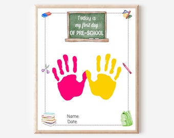 May include: A printable first day of preschool sign with a chalkboard that says "Today is my first day of pre-school". There are two handprints, one pink and one yellow, and school supplies like a backpack, scissors, and crayons.