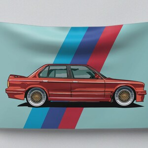 Può includere: Illustrazione di un'auto berlina rossa con cerchi dorati su sfondo azzurro. Strisce verticali blu, blu scuro e rosse sono a sinistra. L'auto è vista di profilo.