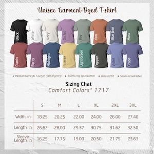 May include: A range of unisex garment-dyed t-shirts in colours like black, white, and blue jean. The image shows a sizing chart with measurements in inches, which are 46.36 cm, 51.44 cm, 55.88 cm, 60.96 cm, 66.04 cm, and 69.6 cm for width. The shirts are made of medium fabric.