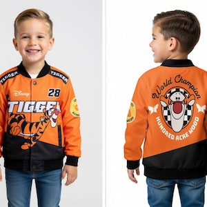 May include: Orange and black Tigger bomber jacket with the text "Tigger" and "28". The jacket features a cartoon Tigger graphic and patches. The back of the jacket says "World Champion" and "Hundred Acre Wood".