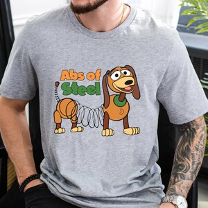 Abs Of Steel Slinky Dog Shirt, Toy Story T-Shirt, Funny Dash Dog, Disney Family Vacation, Disneyland Trip Bild 5
