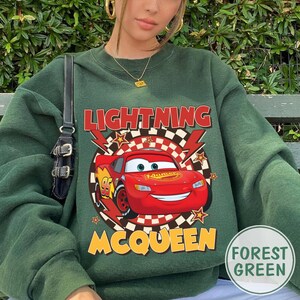 May include: A rustic wooden sign with the text "Welcome to our home" in white lettering. The sign features a distressed finish and a simple, inviting design, perfect for front door decor.