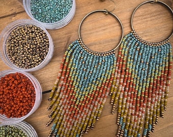 EARTHEN SIREN Hand beaded fringe boho luxe.