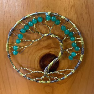 Golden twisted hanging tree wall art