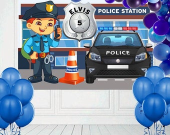 May include: A blue and white police officer backdrop with a police car, a traffic cone, and the text "Elvis Police Station" and "Police".