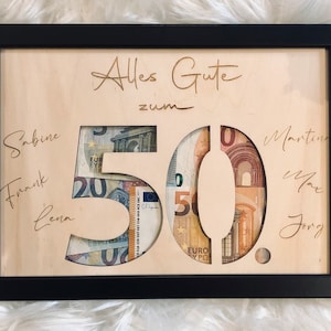 Wooden money gift in picture frame