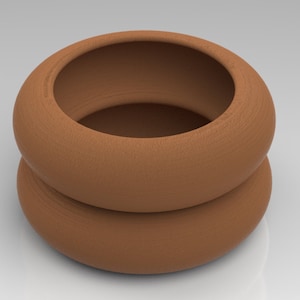 May include: A terracotta planter with a rounded, cylindrical shape. The planter is made of two stacked pieces, creating a double-tiered design.