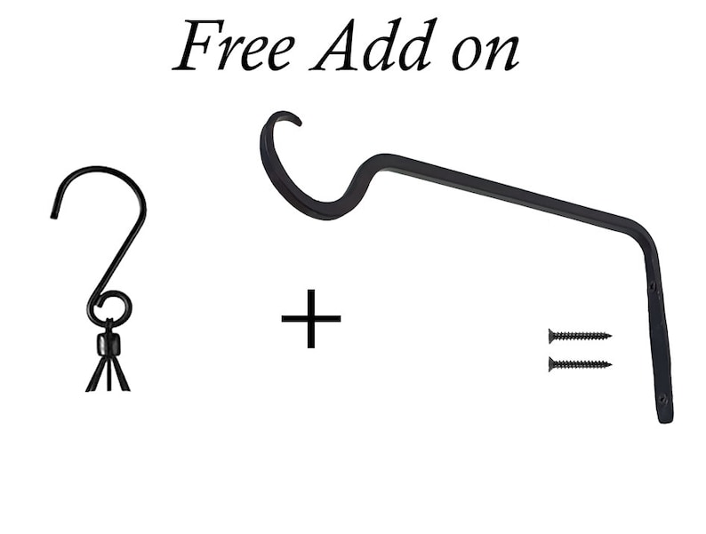 May include: Black metal hook and bracket set with screws. The text "Free Add on" is displayed above the items. The hook is a simple curved design, while the bracket has a curved top and a straight arm. The set includes two screws.
