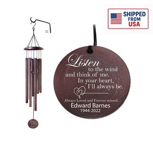 May include: A brown wind chime with bronze-colored tubes and a circular plaque. The plaque reads "Listen to the wind and think of me. In your heart, I'll always be." with the name Edward Barnes and dates 1944-2022.
