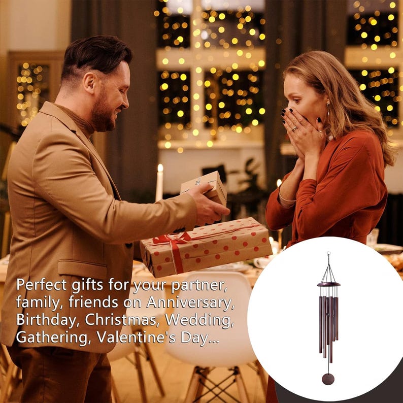 May include: A hanging wind chime featuring a dark circular wooden top, six metallic bronze-colored cylindrical tubes of varying lengths, and a matching circular wooden striker suspended by thin cords from a central metal ring at the top.