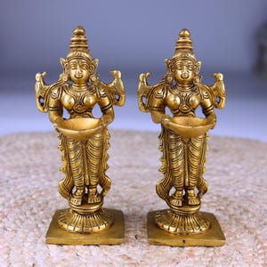 Brass Lakshmi Statue with Lamps: Deepa Laxmi Pooja Decor (Set of 2)