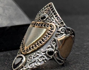 Anillo ajustable de plata esterlina con forma de arquero para el pulgar, hecho a mano y oxidado con Zihgir.