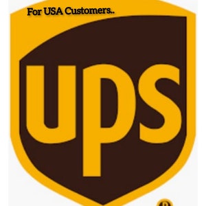 May include: The UPS logo is a brown shield with a gold outline. The letters UPS are in gold and are centered on the shield. The logo has a registered trademark symbol in the lower right corner. The text "For USA Customers." is above the logo.
